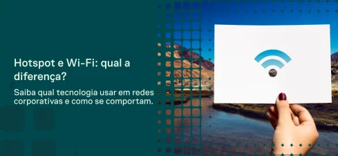 Imagem de pessoas em uma reunião de negócios usando notebooks e celulares em um ambiente corporativo, com texto sobre Wi‑Fi ou Hotspot e a diferença para o seu negócio.