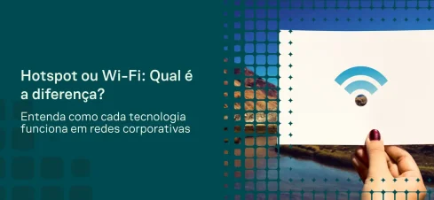 Imagem de pessoas em uma reunião de negócios usando notebooks e celulares em um ambiente corporativo, com texto sobre Wi‑Fi ou Hotspot e a diferença para o seu negócio.