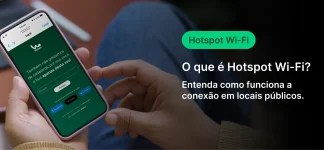 Pessoa utilizando um smartphone para acessar Hotspot Wi-Fi, explicando como funciona a conexão em locais públicos.