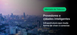 Imagem de uma cidade moderna com edifícios altos sob céu nublado, destacando a importância de provedores de telefonia e infraestrutura para cidades inteligentes.