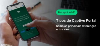 Pessoa segurando um smartphone exibindo uma tela de portal de Wi-Fi hotspot, enquanto lê informações sobre tipos de portal captivo em um ambiente de trabalho, com foco em tecnologia de conexão Wi-Fi e segurança de rede.